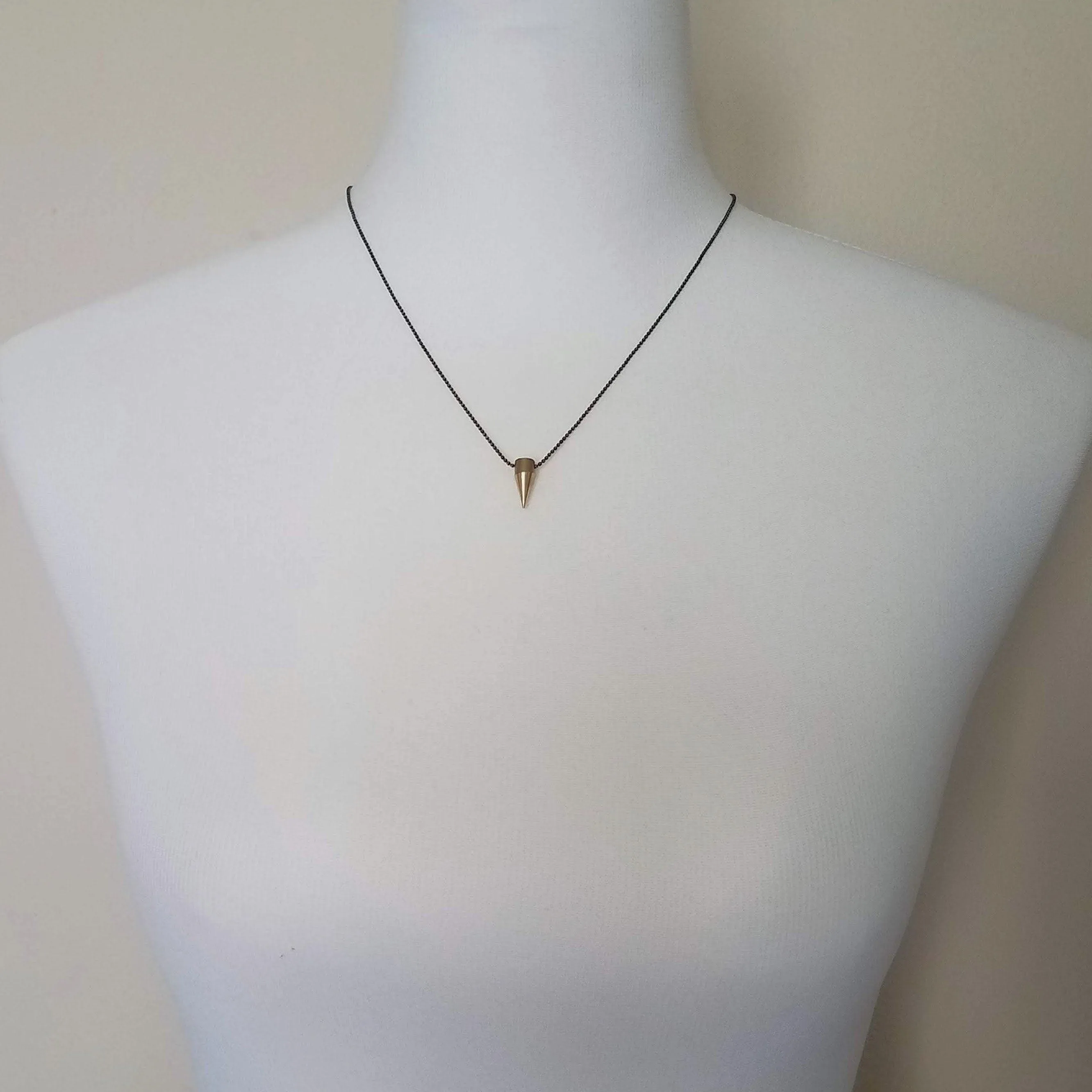 Gold Spike Necklace, solid brass bullet point pendant, gold dagger necklace, black chain necklace, black gold necklace, gold bullet necklace