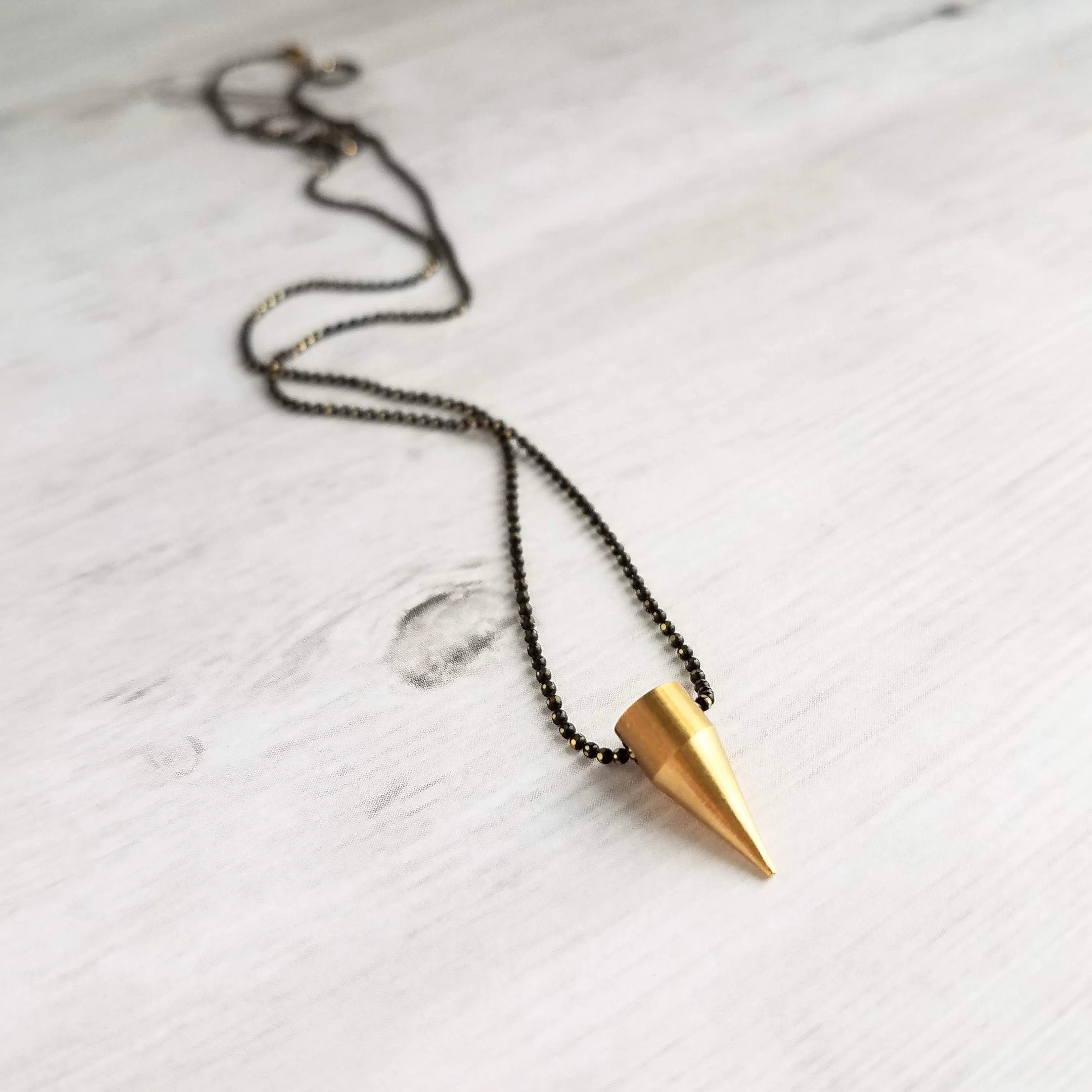 Gold Spike Necklace, solid brass bullet point pendant, gold dagger necklace, black chain necklace, black gold necklace, gold bullet necklace