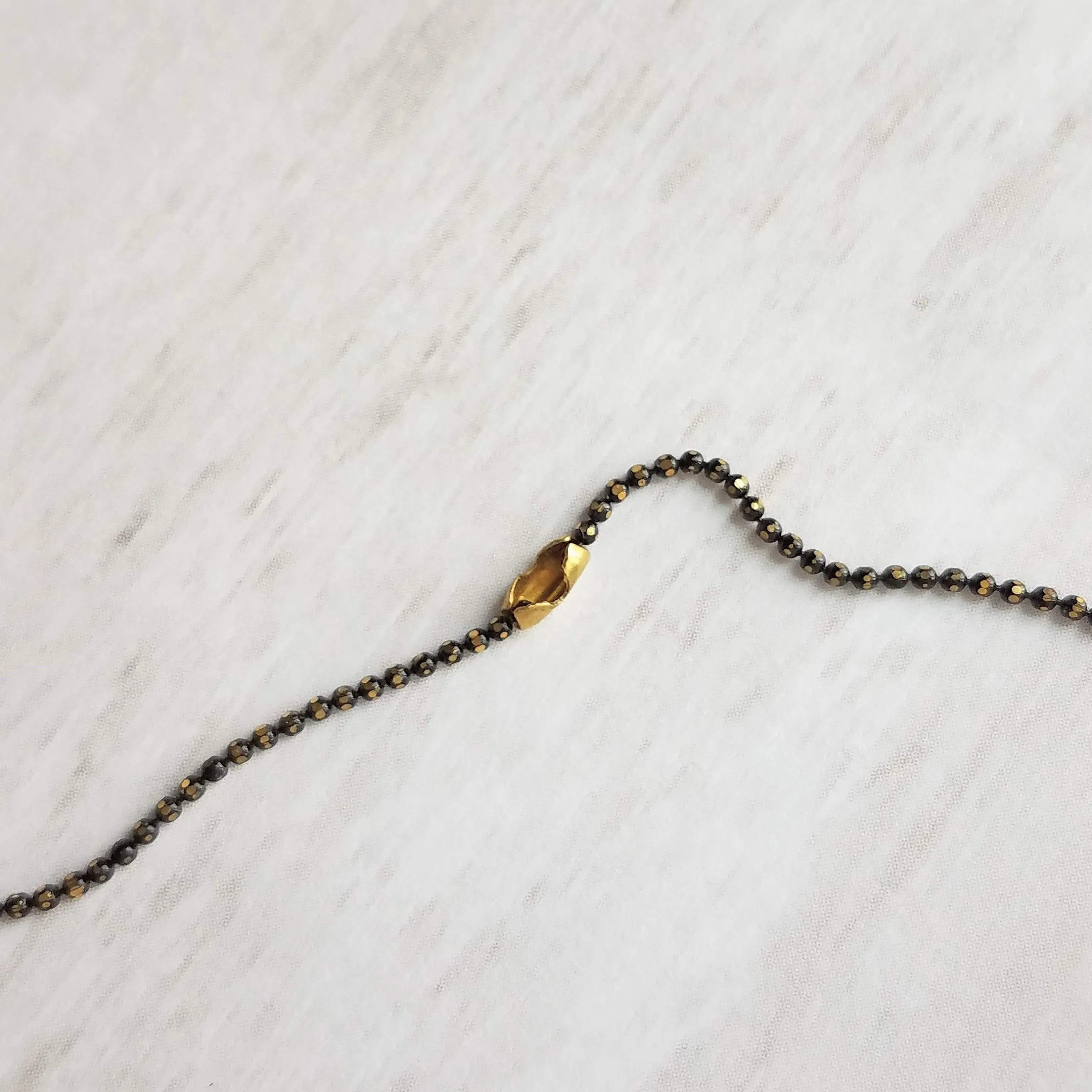 Gold Spike Necklace, solid brass bullet point pendant, gold dagger necklace, black chain necklace, black gold necklace, gold bullet necklace
