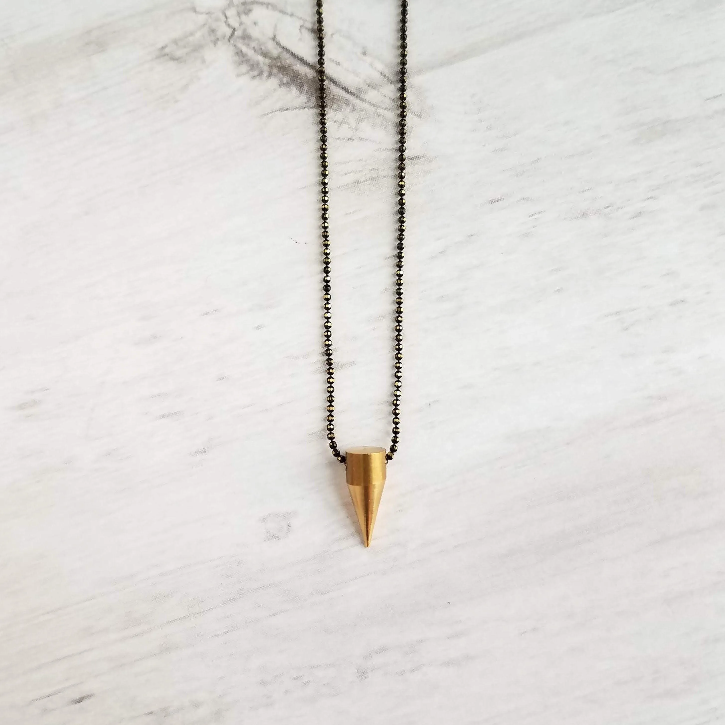 Gold Spike Necklace, solid brass bullet point pendant, gold dagger necklace, black chain necklace, black gold necklace, gold bullet necklace
